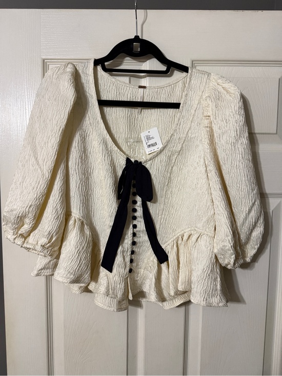 Free People Tops - Free People Cream Textured Peplum Blouse with Black Bow